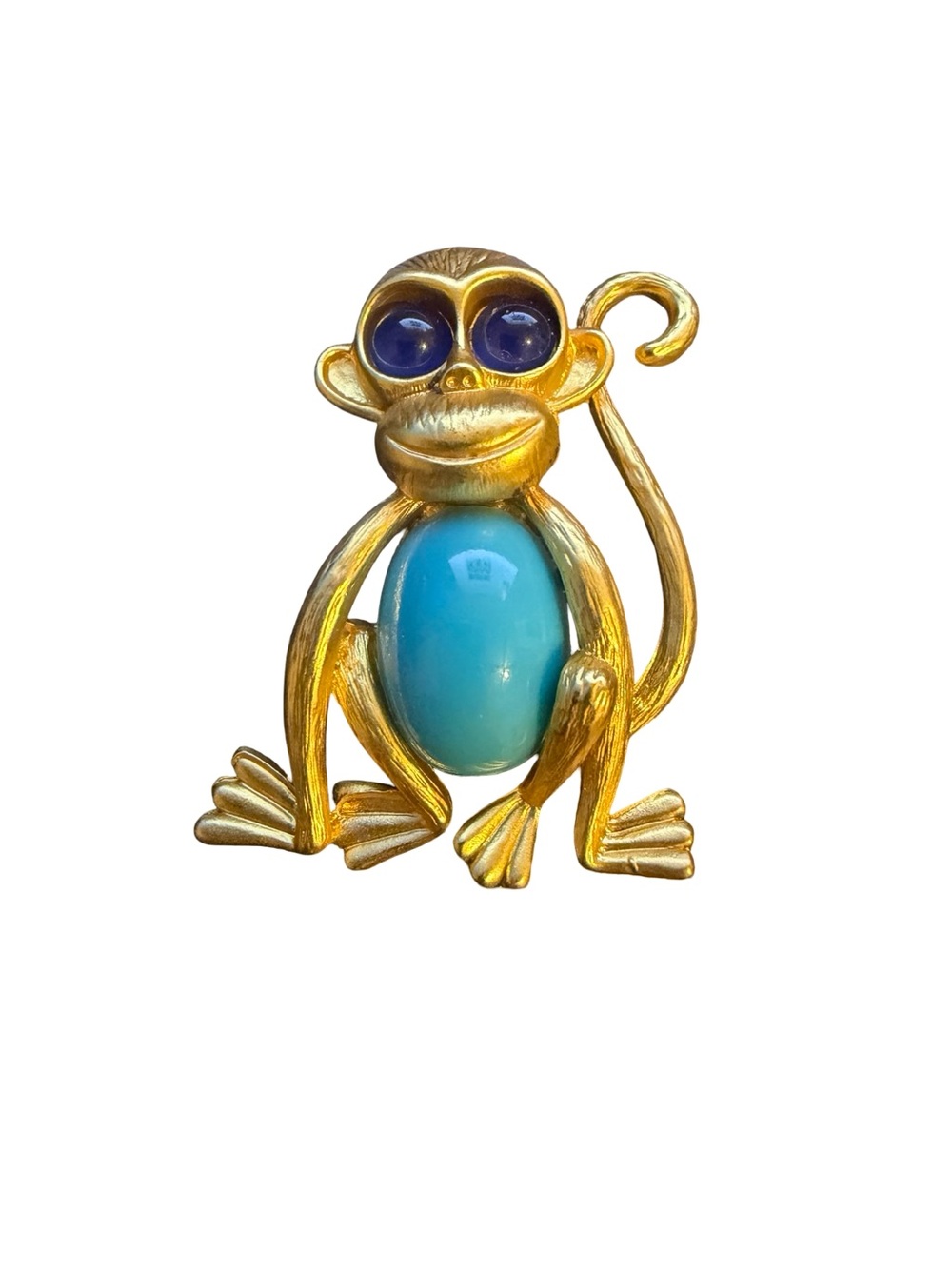 Gold-Tone Monkey Brooch with Blue Cabochon Body and deep blue eyes